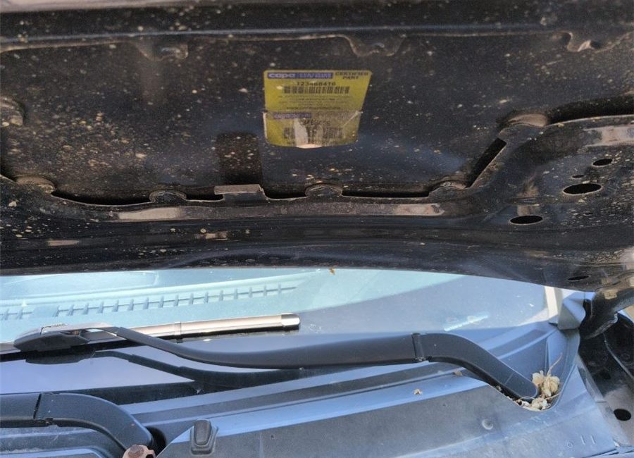 Label on an aftermarket spare part under the hood